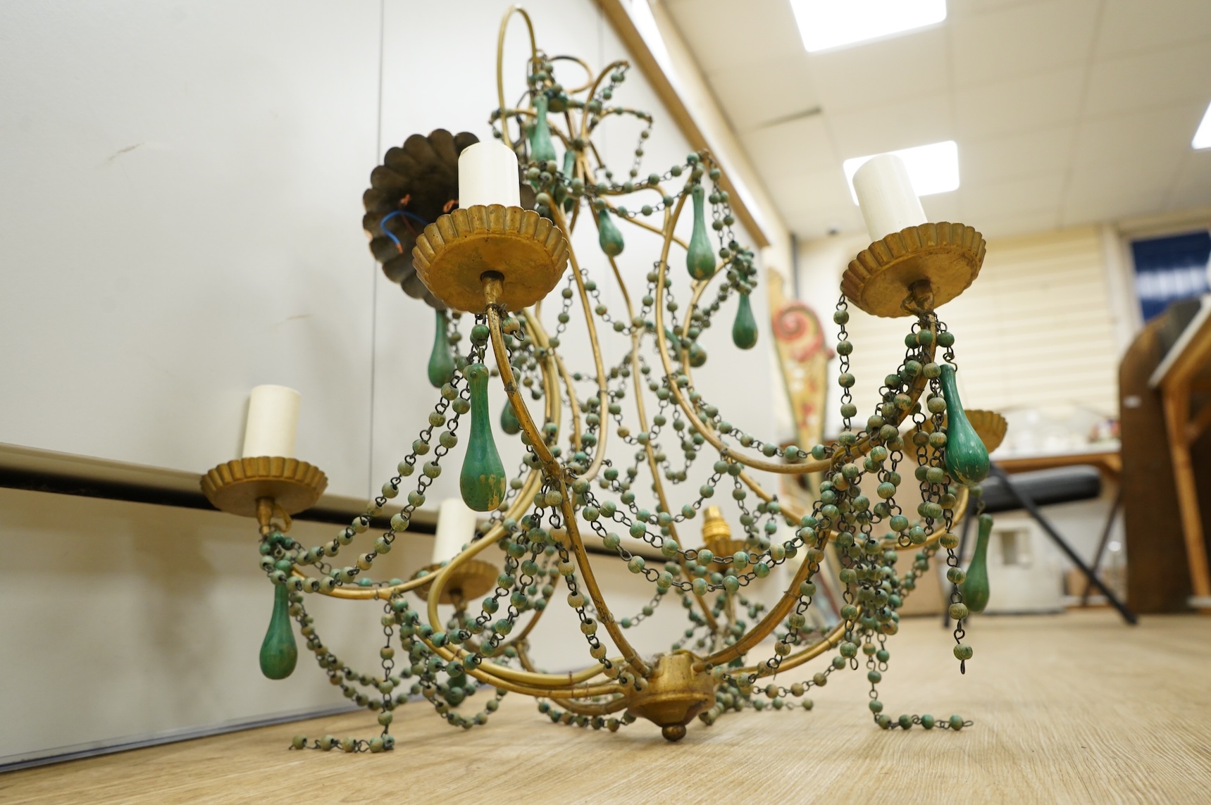 A beaded and gilt metal six branch electrolier, 86cm high